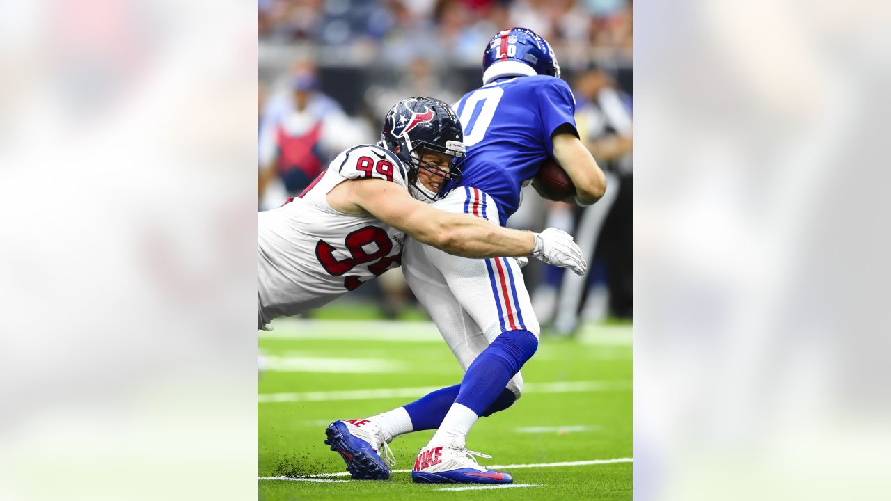 Houston Texans - Houston Texans defensive end J.J. Watt shows his Salute to  Service gloves as he warms up before the Week 9 win over Buffalo.