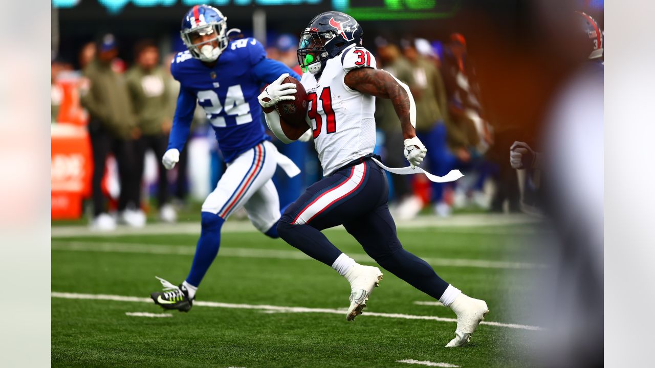 New York Giants linebacker Tomon Fox (49) walks off the field after an NFL football  game against the Houston Texans on Sunday, Nov. 13, 2022, in East  Rutherford, N.J. (AP Photo/Adam Hunger