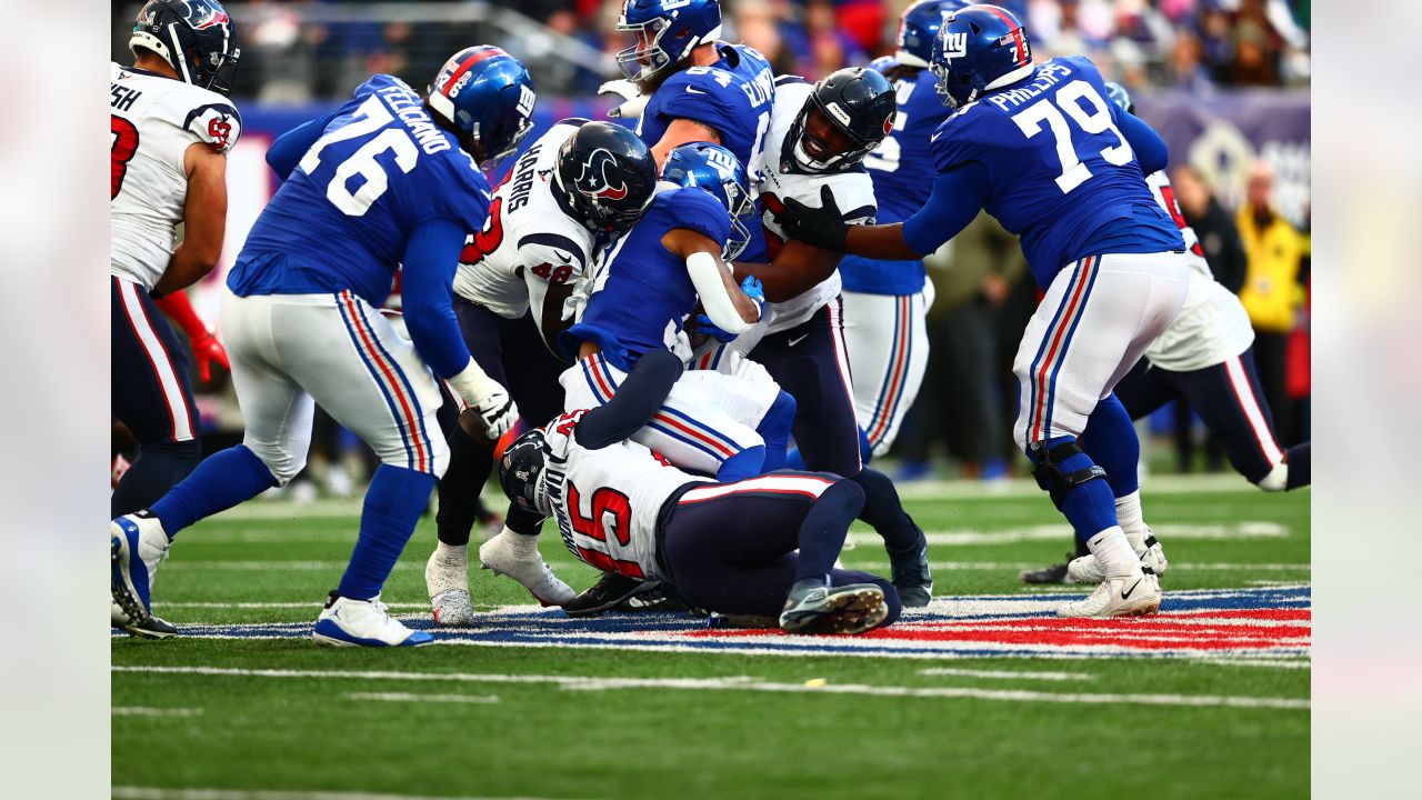 New York Giants guard Jon Feliciano (76) in coverage during an NFL football  game against the