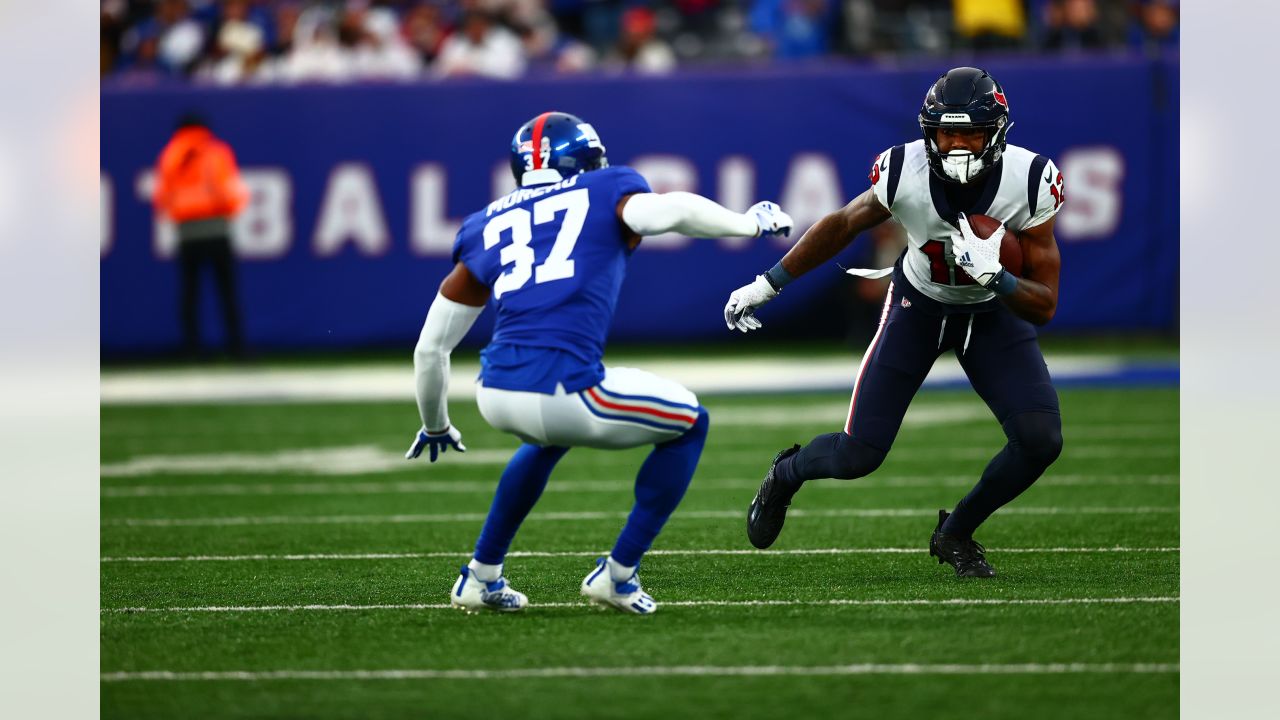 Jones, Barkley lead Giants past Texans 24-16 for 7-2 start