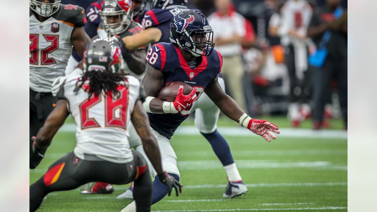 Texans' Romeo Crennel not ready to flash Super Bowl rings yet