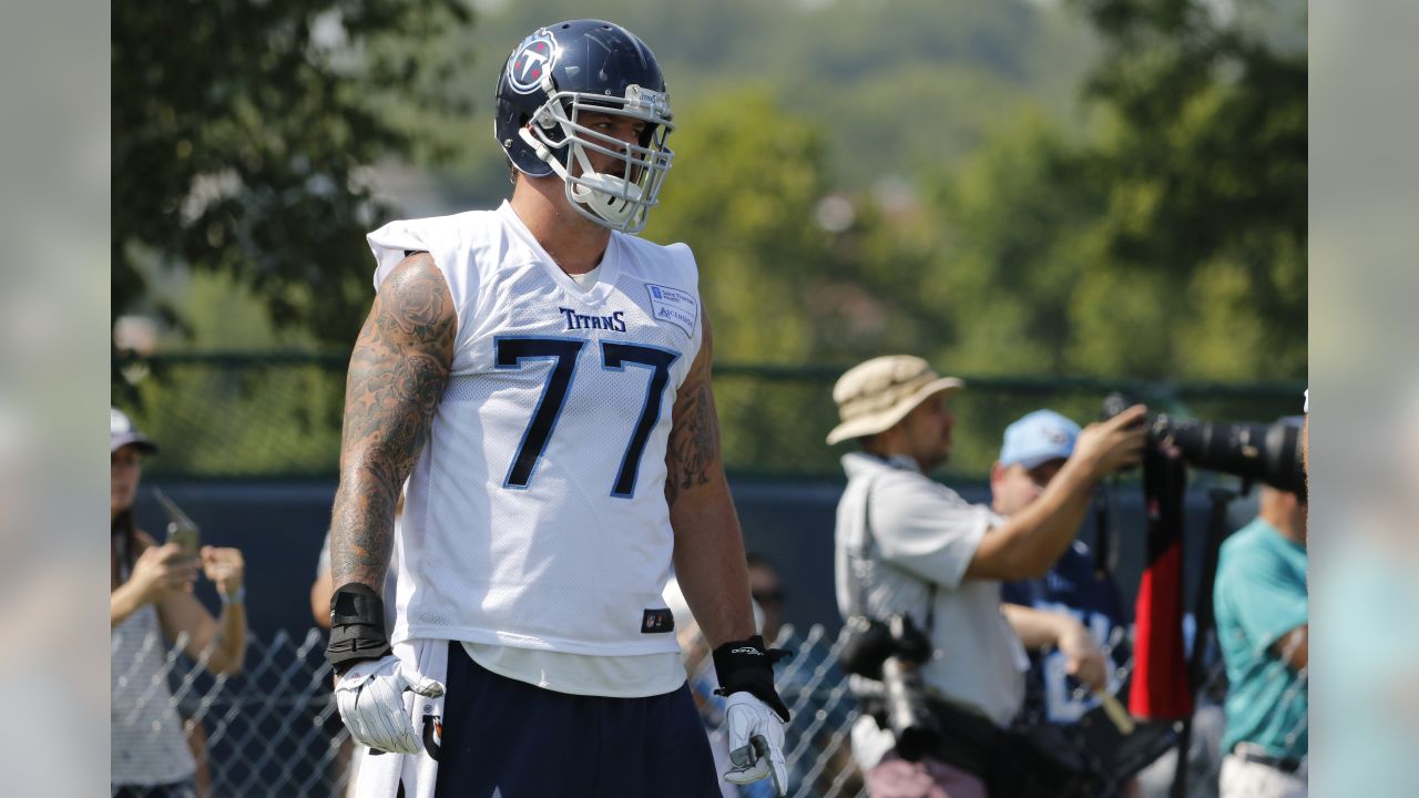 October 31, 2021: Tennessee Titans offensive lineman Taylor Lewan (77)  during NFL football game action between the Tennessee Titans and the  Indianapolis Colts at Lucas Oil Stadium in Indianapolis, Indiana. Tennessee  defeated