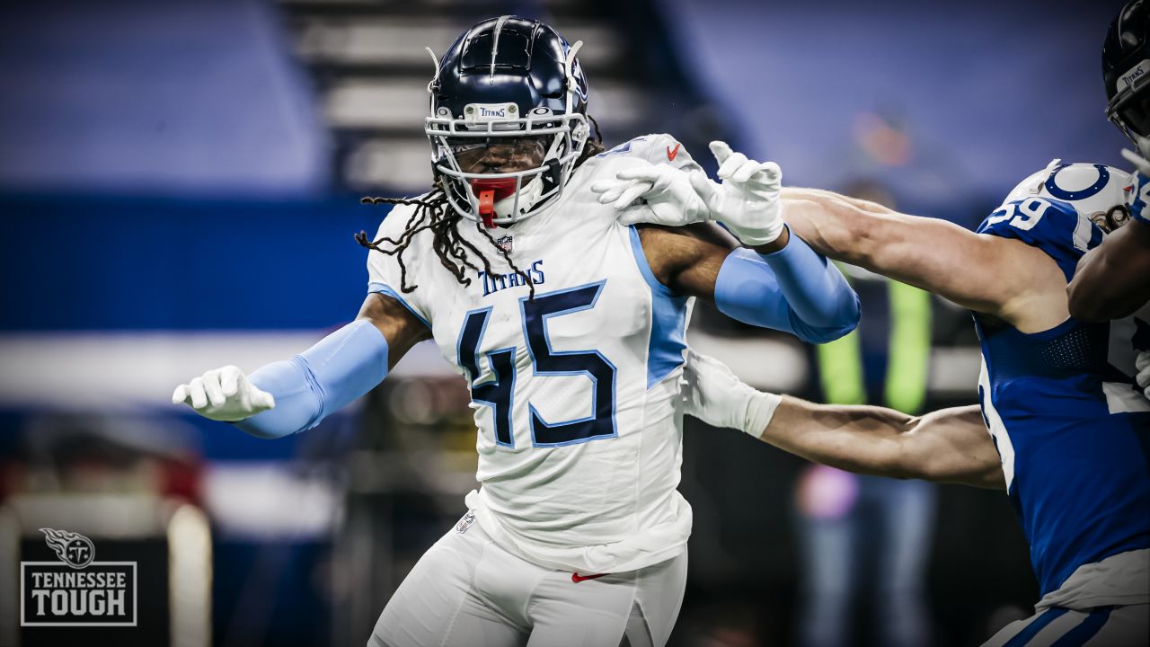 Henry leads Titans' run to AFC South lead 45-26 over Colts