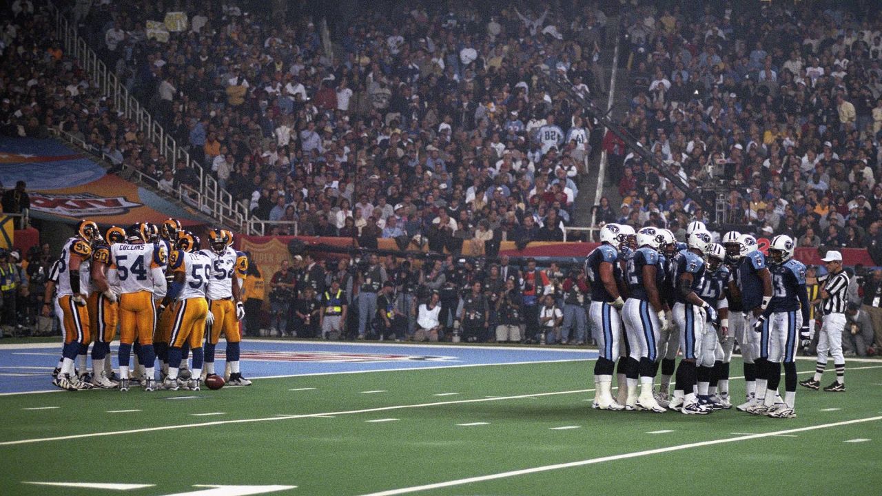 January 30, 2000: St. Louis Rams quarterback Kurt Warner #13 drops back to  pass against the Tennessee Titans in Super Bowl XXXIV (34). The Rams  defeated the Titans by the final score