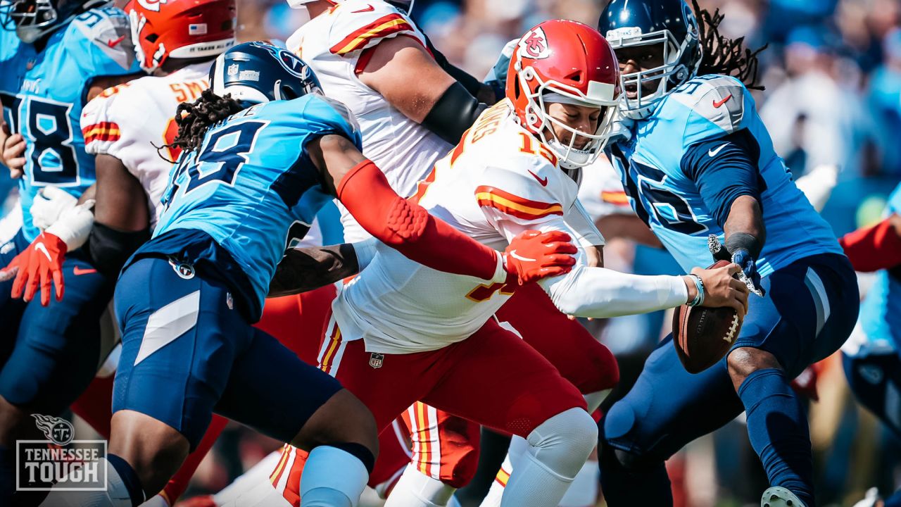 Titans force four turnovers in 27-23 win