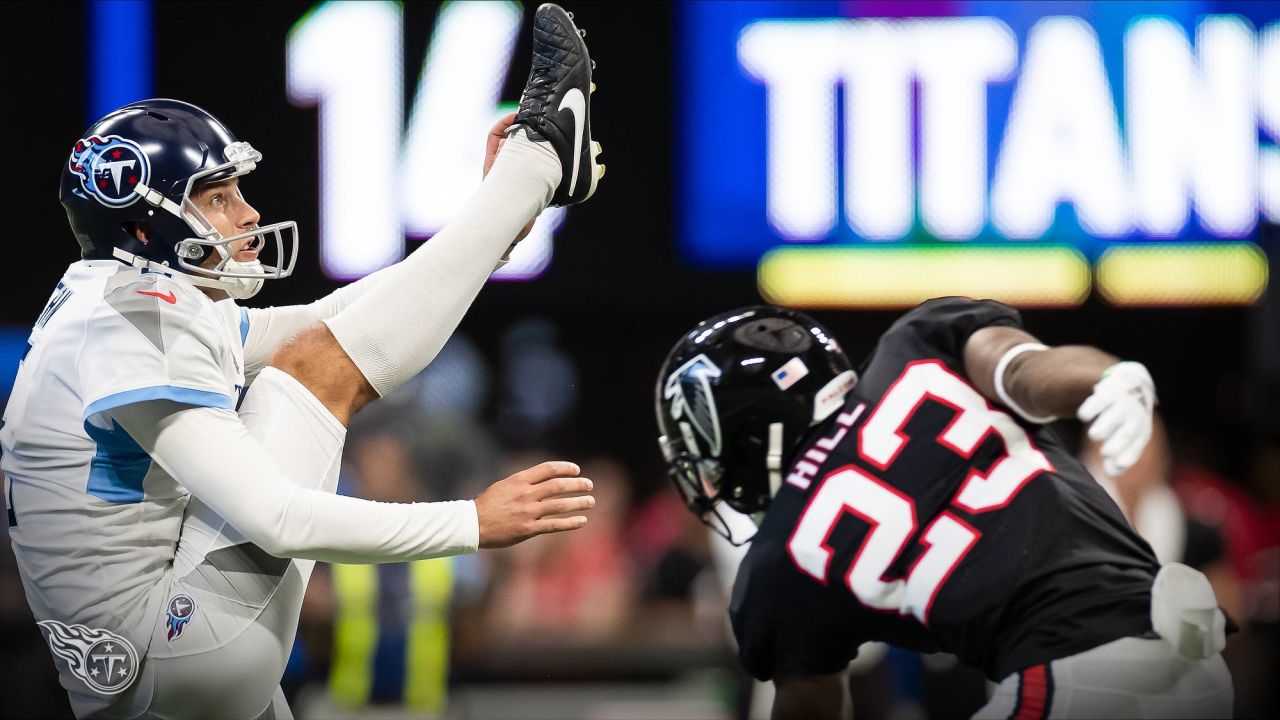 Tennessee Titans punter Brett Kern #6 is thrown for a loss while attempting  a fake punt during an NFL football game between the Tampa Bay Buccaneers  and the Tennessee Titans, Sunday, Oct.