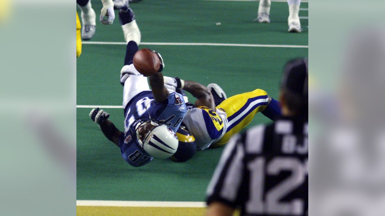 Tennessee Titans WR Kevin Dyson is tackled just short of the goal