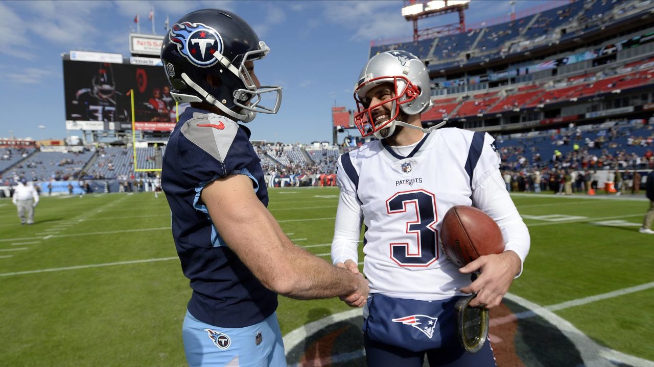 New England Patriots quarterback Tom Brady greets members of the U.S.  military along the sideline before an NFL football game against the Atlanta  Falcons, Sunday, Oct. 22, 2017, in Foxborough, Mass. (AP