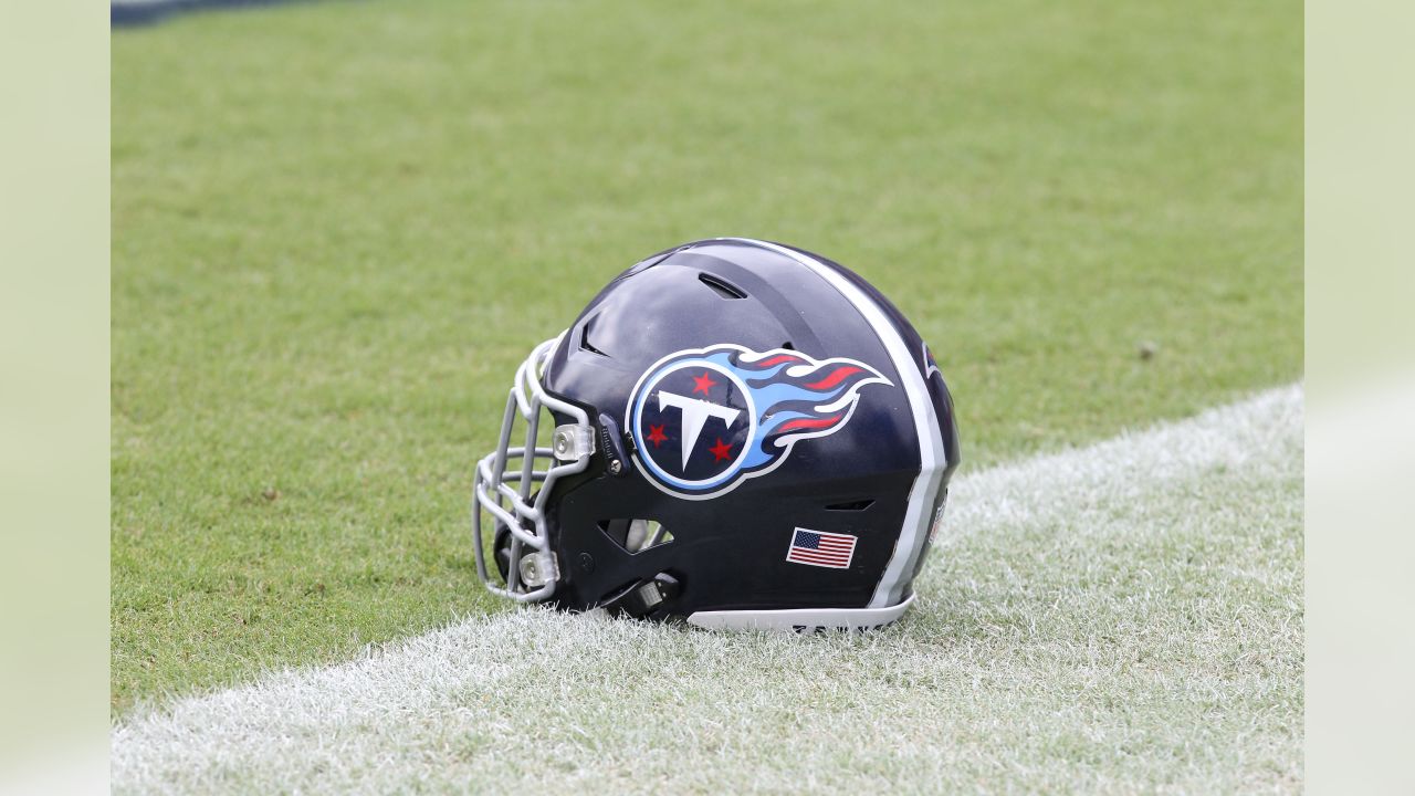 Houston Texans staff members check radio signals in helmets before an NFL football  game between the Texans and the Tennessee Titans Sunday, Oct. 18, 2020, in  Nashville, Tenn. (AP Photo/Mark Zaleski Stock