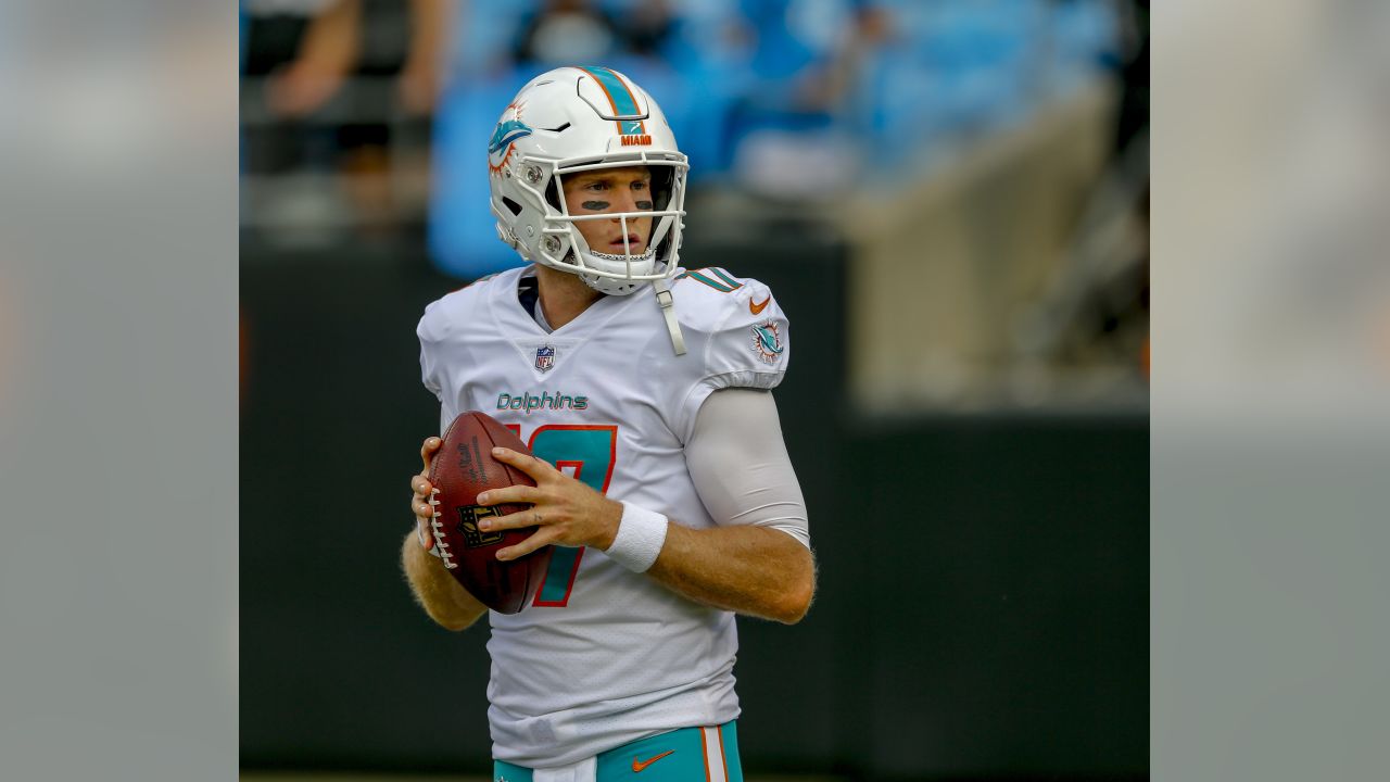 Miami Dolphins quarterback Ryan Tannenhill (17) calls a play in the huddle  during the first half against the Seattle Seahawks at Sun Life Stadium  November 25, 2012 in Miami, Florida. The Miami