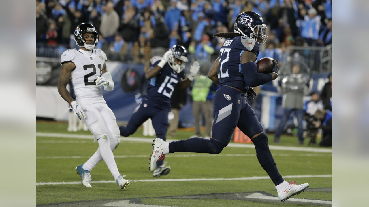 Henry's TD run in OT lifts Titans over skidding Ravens 30-24