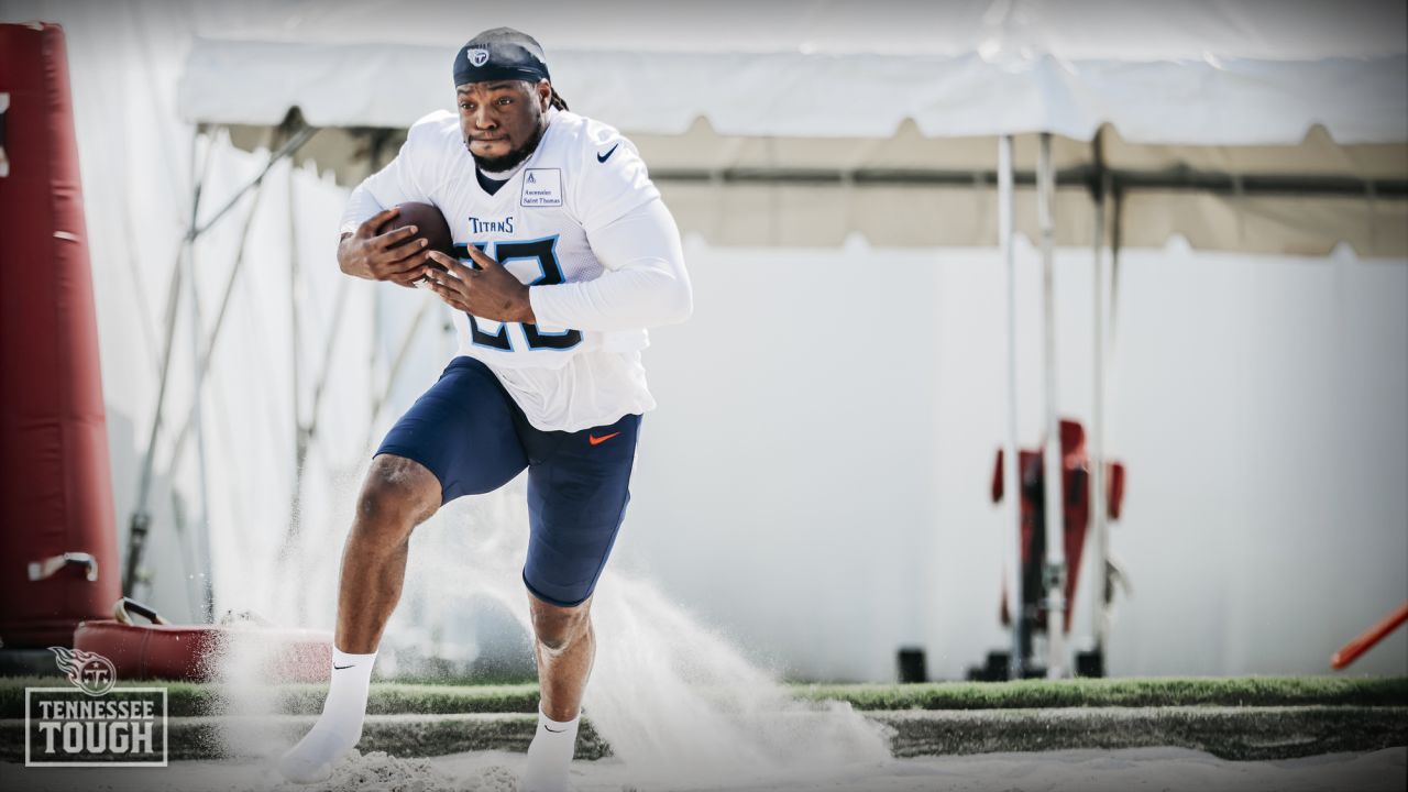 Tennessee Titans' Derrick Henry works out in sandpit at training camp