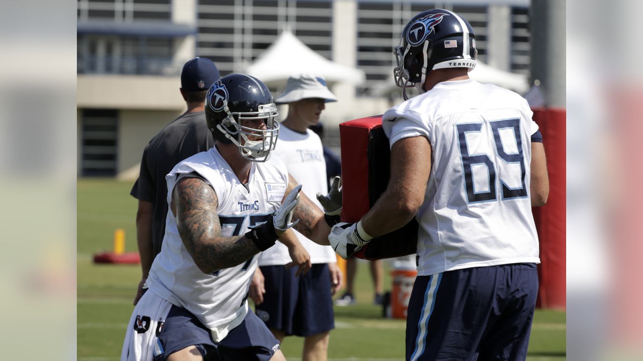 Pro Bowl left tackle Taylor Lewan reports for Titans camp