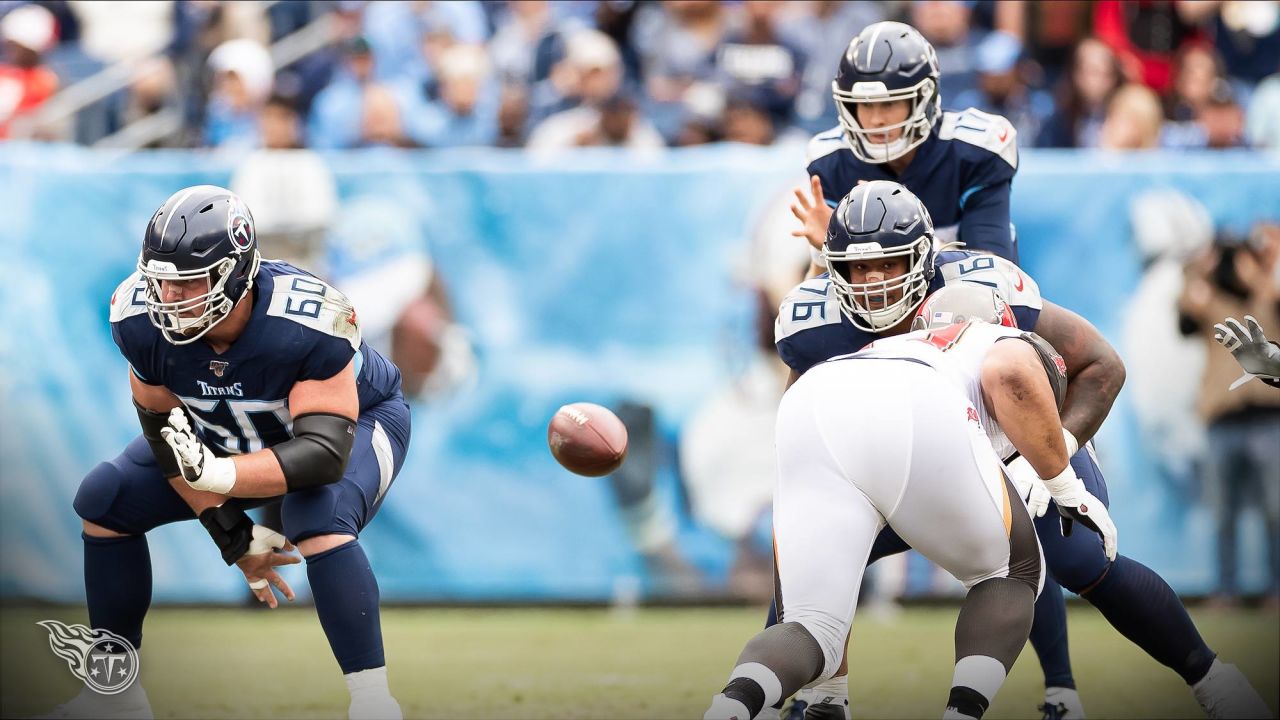 Tennessee Titans center Ben Jones (60) runs onto the field before