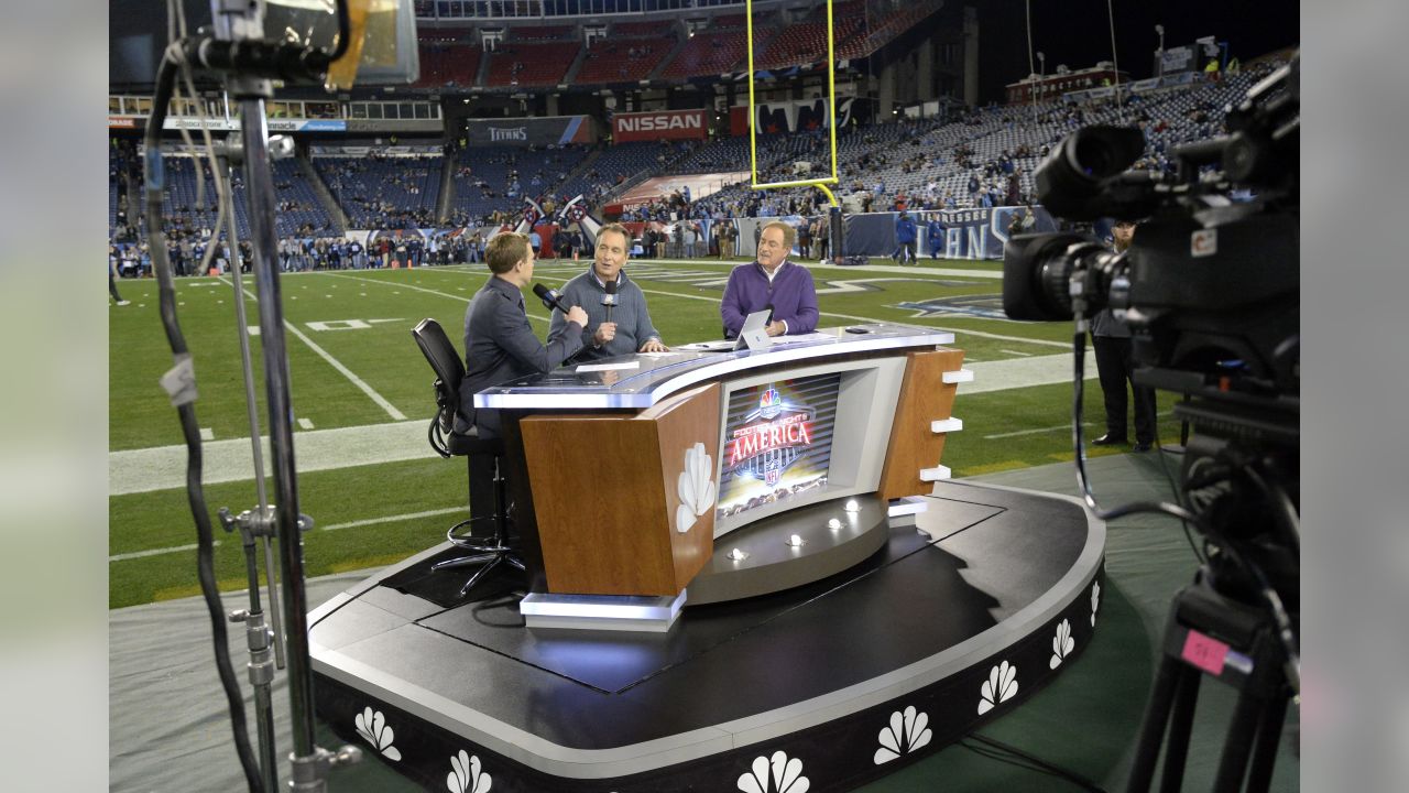 NBC broadcasters work from the field in Nissan Stadium before an NFL  football game between the Tennessee Titans and the Indianapolis Colts  Sunday, Dec. 30, 2018, in Nashville, Tenn. (AP Photo/Mark Zaleski