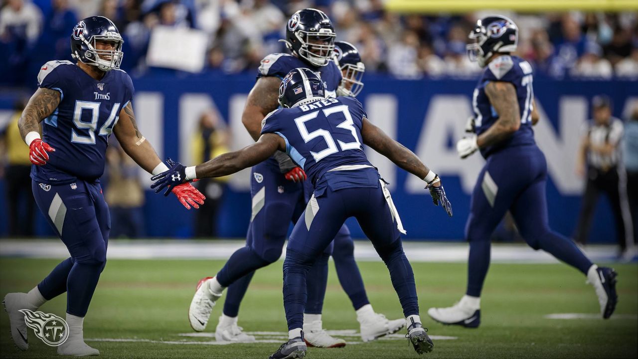 Tennessee Titans defensive tackle Jeffery Simmons (98) and linebacker  Rashad Weaver (99) talk before play starts