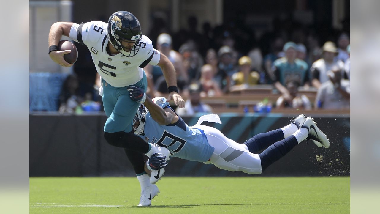 September 9, 2018 - East Rutherford, New Jersey, U.S. - Jacksonville Jaguars  quarterback Blake Bortles (5) hands off to running back T.J. Yeldon (24)  during a NFL game between the Jacksonville Jaguars