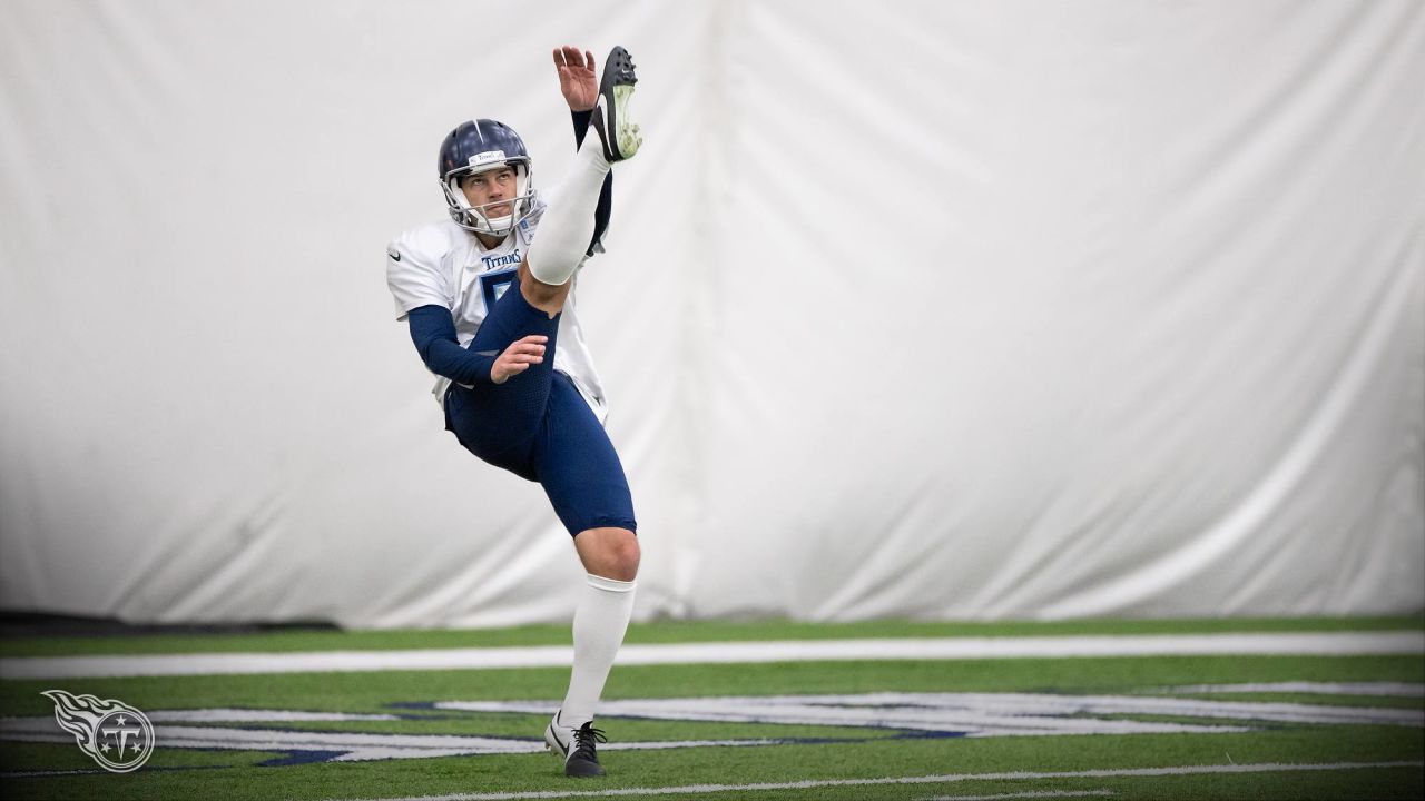 Tennessee Titans punter Brett Kern #6 is thrown for a loss while attempting  a fake punt during an NFL football game between the Tampa Bay Buccaneers  and the Tennessee Titans, Sunday, Oct.