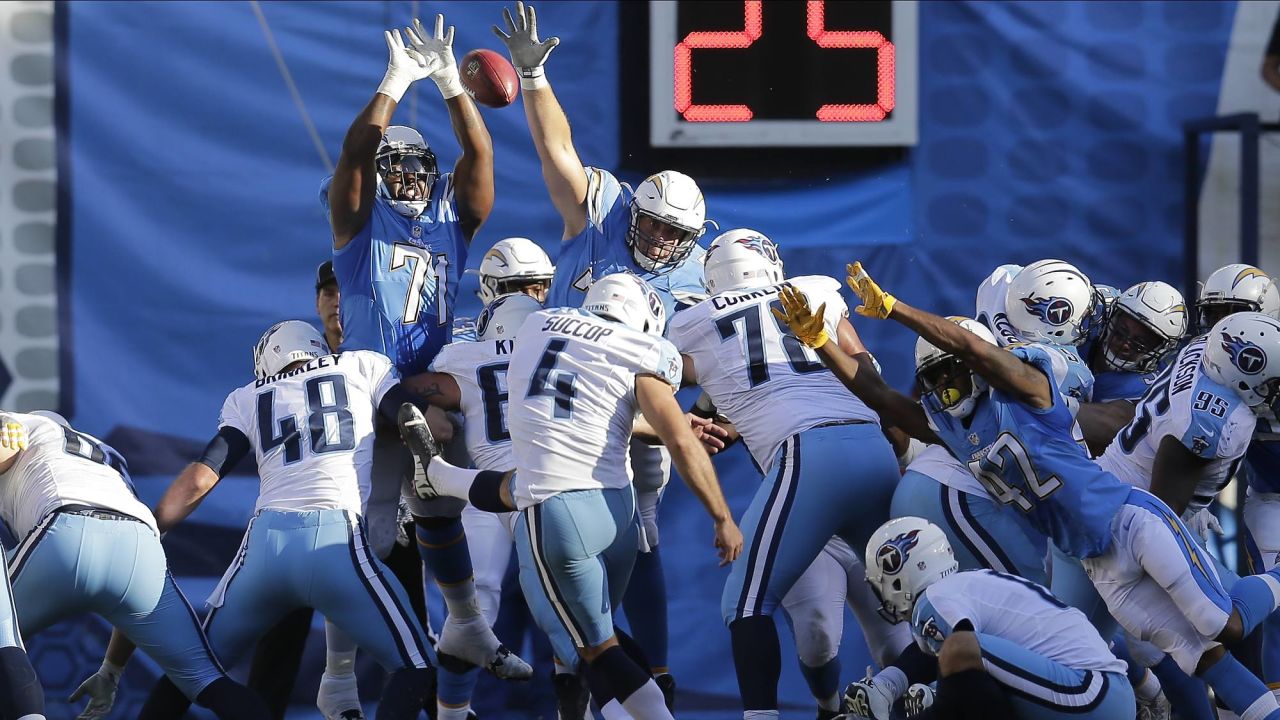 Tennessee Titans holder Brett Kern (6) signals good as kicker Ryan Succop  (4) smiles after Succop kicked a 50 yard field goal to go ahead of the San  Francisco 49ers with one