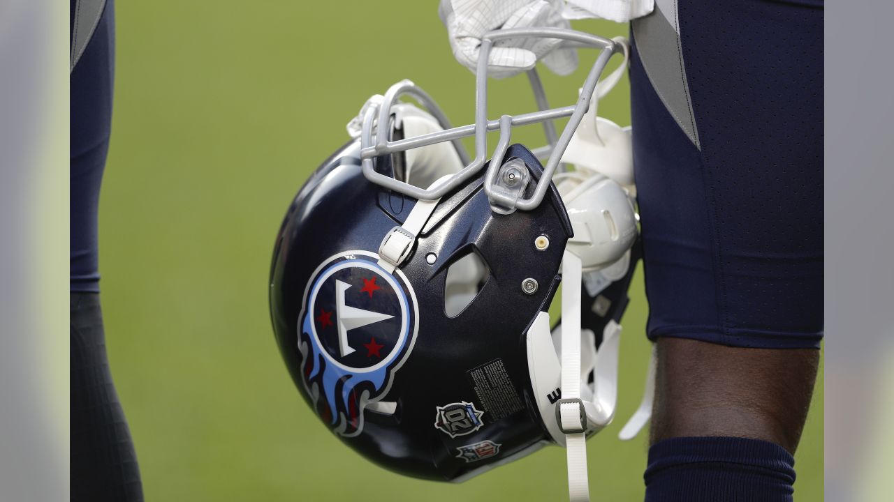 Houston Texans staff members check radio signals in helmets before an NFL  football game between the Texans and the Tennessee Titans Sunday, Oct. 18,  2020, in Nashville, Tenn. (AP Photo/Mark Zaleski Stock