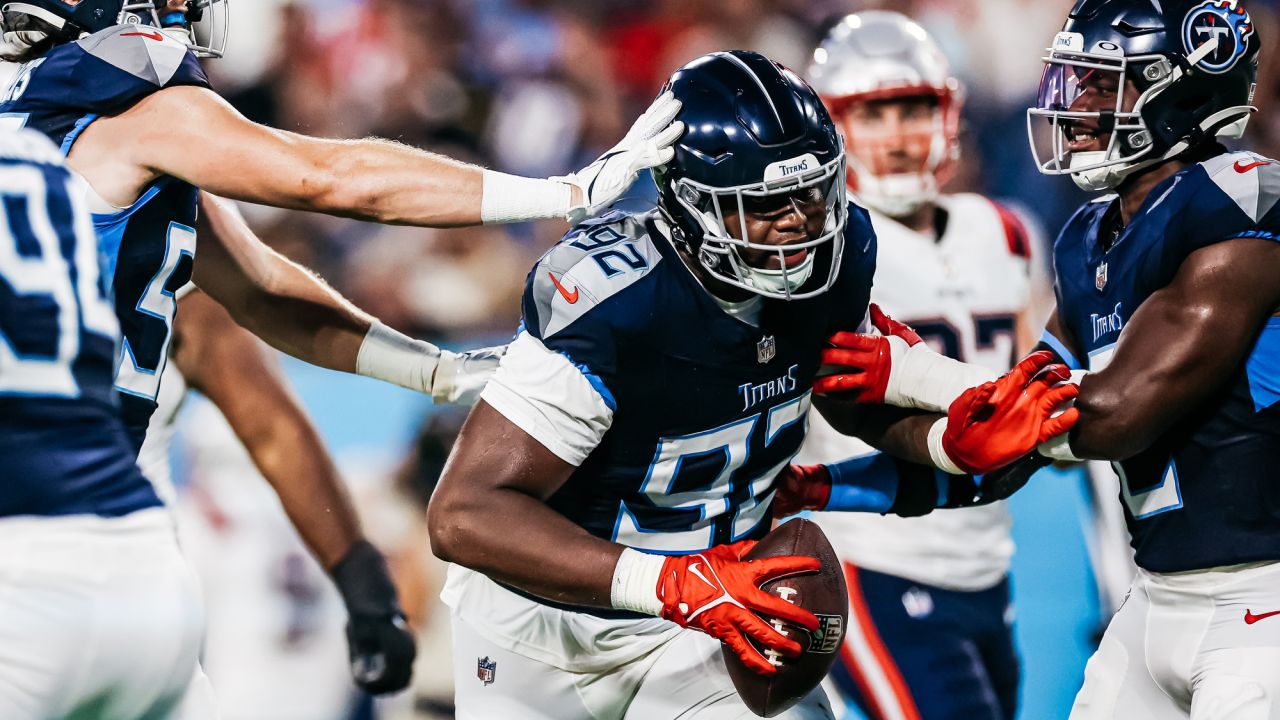 NASHVILLE, TN - AUGUST 20: Tennessee Titans quarterback Malik Willis (7)  turns to hand the ball off during the Tampa Bay Buccaneers-Tennessee Titans  Preseason game on August 20, 2022 at Nissan Stadium