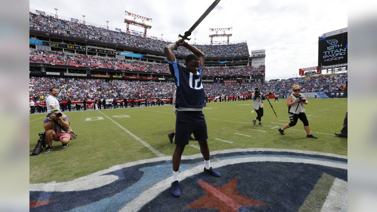 Houston Texans staff members check radio signals in helmets before an NFL football  game between the Texans and the Tennessee Titans Sunday, Oct. 18, 2020, in  Nashville, Tenn. (AP Photo/Mark Zaleski Stock