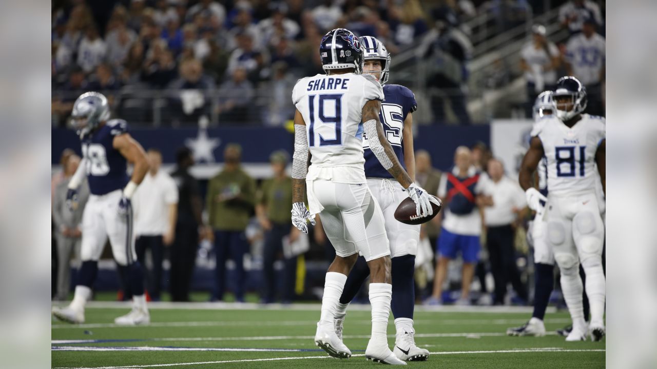 November 05, 2018:.Tennessee Titans quarterback Marcus Mariota (8)  scrambles for a first down during an NFL football game between the Tennessee  Titans and Dallas Cowboys at AT&T Stadium in Arlington, Texas. Manny