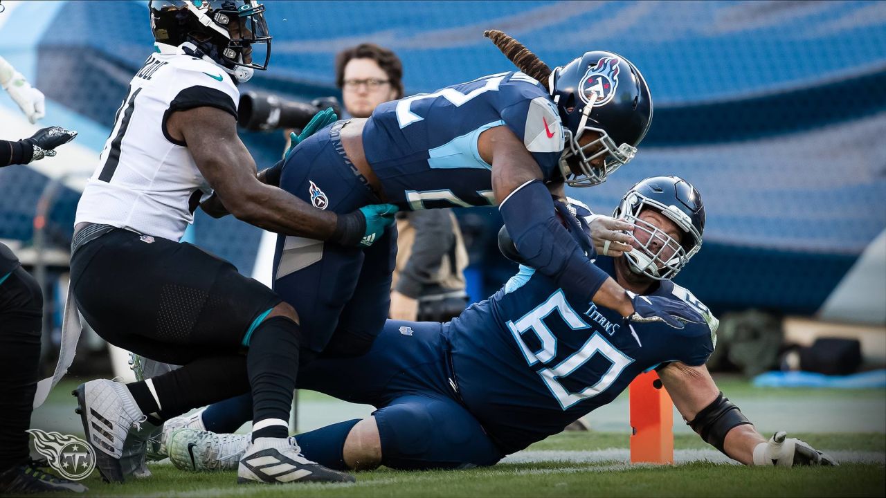 Tennessee Titans center Ben Jones (60) runs onto the field before