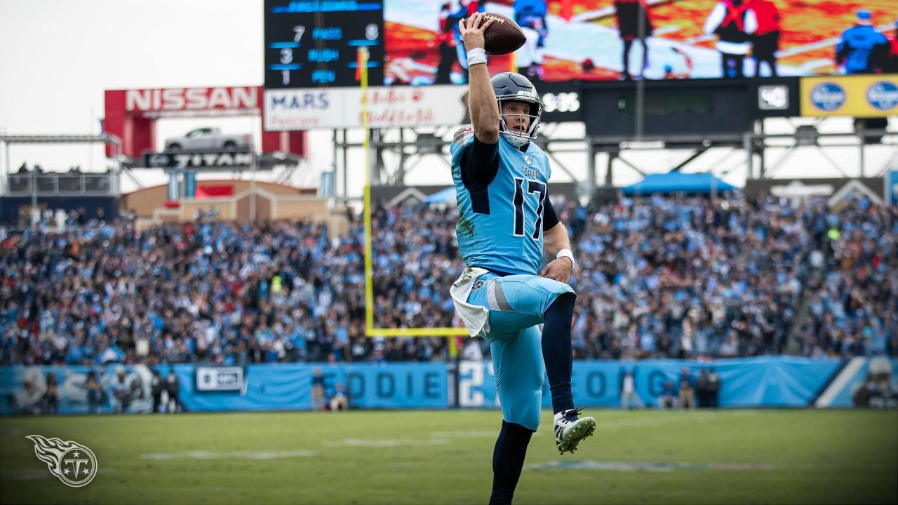 Tennessee Titans quarterback Ryan Tannehill (17) hands off to Trunning back  Derrick Henry (22) during the first half of an NFL Divisional Playoff game  at Nissan Stadium in Nashville, Tennessee, on Saturday