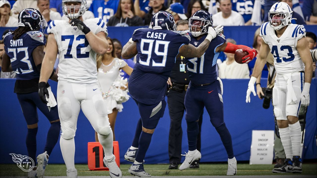 Tennessee Titans defensive tackle Jeffery Simmons (98) and linebacker  Rashad Weaver (99) talk before play starts