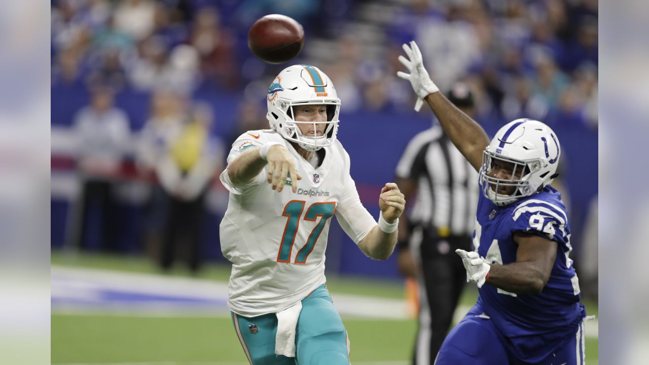 Miami Dolphins quarterback Ryan Tannenhill (17) calls a play in the huddle  during the first half against the Seattle Seahawks at Sun Life Stadium  November 25, 2012 in Miami, Florida. The Miami