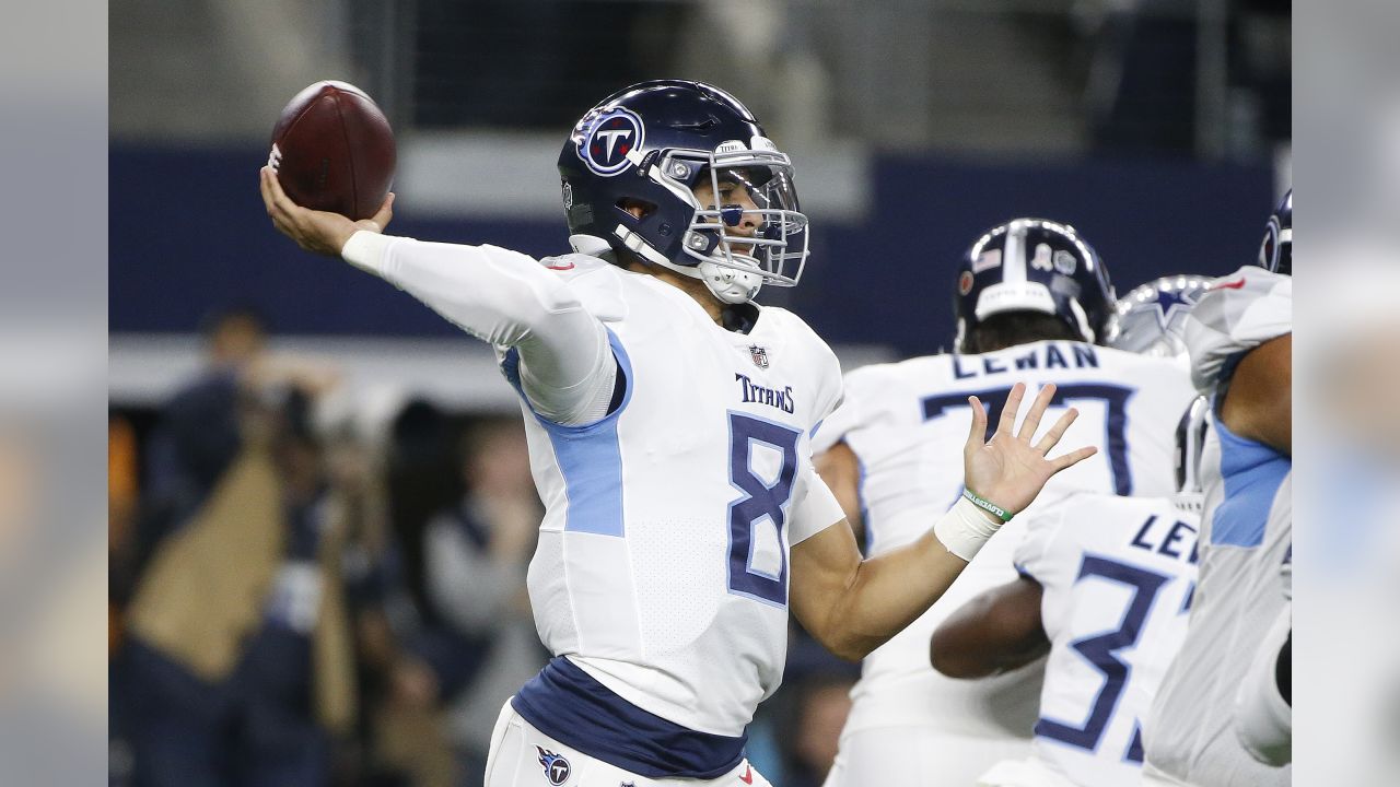 November 05, 2018:.Tennessee Titans quarterback Marcus Mariota (8)  scrambles for a first down during an NFL football game between the Tennessee  Titans and Dallas Cowboys at AT&T Stadium in Arlington, Texas. Manny