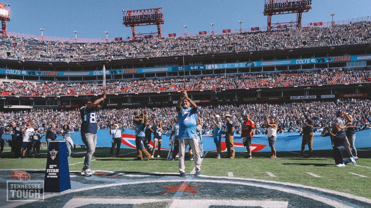 NBC broadcasters work from the field in Nissan Stadium before an NFL  football game between the Tennessee Titans and the Indianapolis Colts  Sunday, Dec. 30, 2018, in Nashville, Tenn. (AP Photo/Mark Zaleski