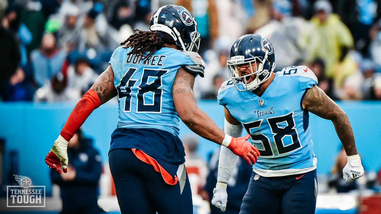 Titans clinch AFC South with 34-3 rout of Dolphins