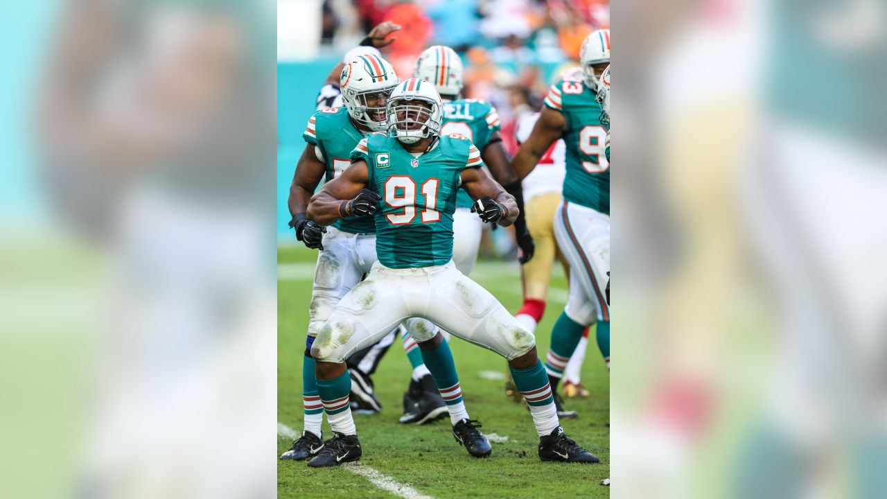 Miami Dolphins quarterback Jay Cutler (6) works against the Atlanta  FalconsH during the first half of an NFL football game, Sunday, Oct. 15,  2017, in Atlanta. (AP Photo/David Goldman)