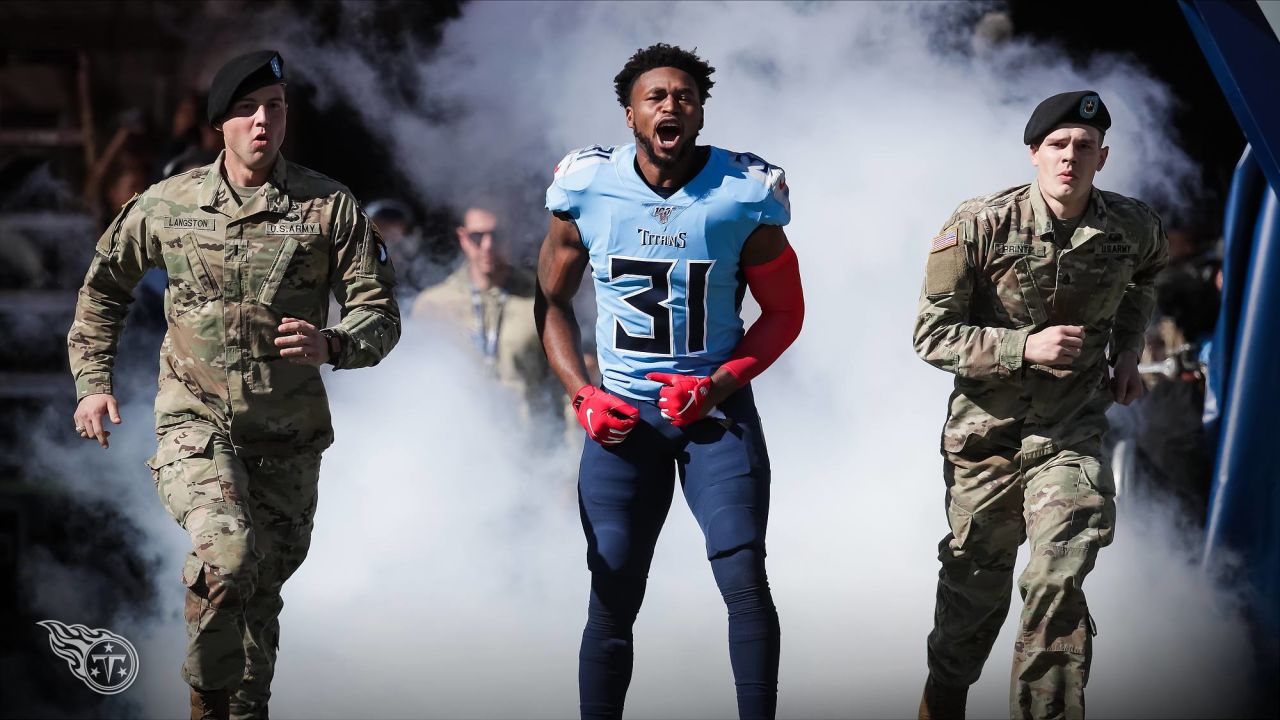 Tennessee Titans free safety Kevin Byard (31) runs to the sideline after  the coin toss before an NFL football game against the Jacksonville Jaguars  on Sunday, December 12, 2021, in Nashville, Tenn. (