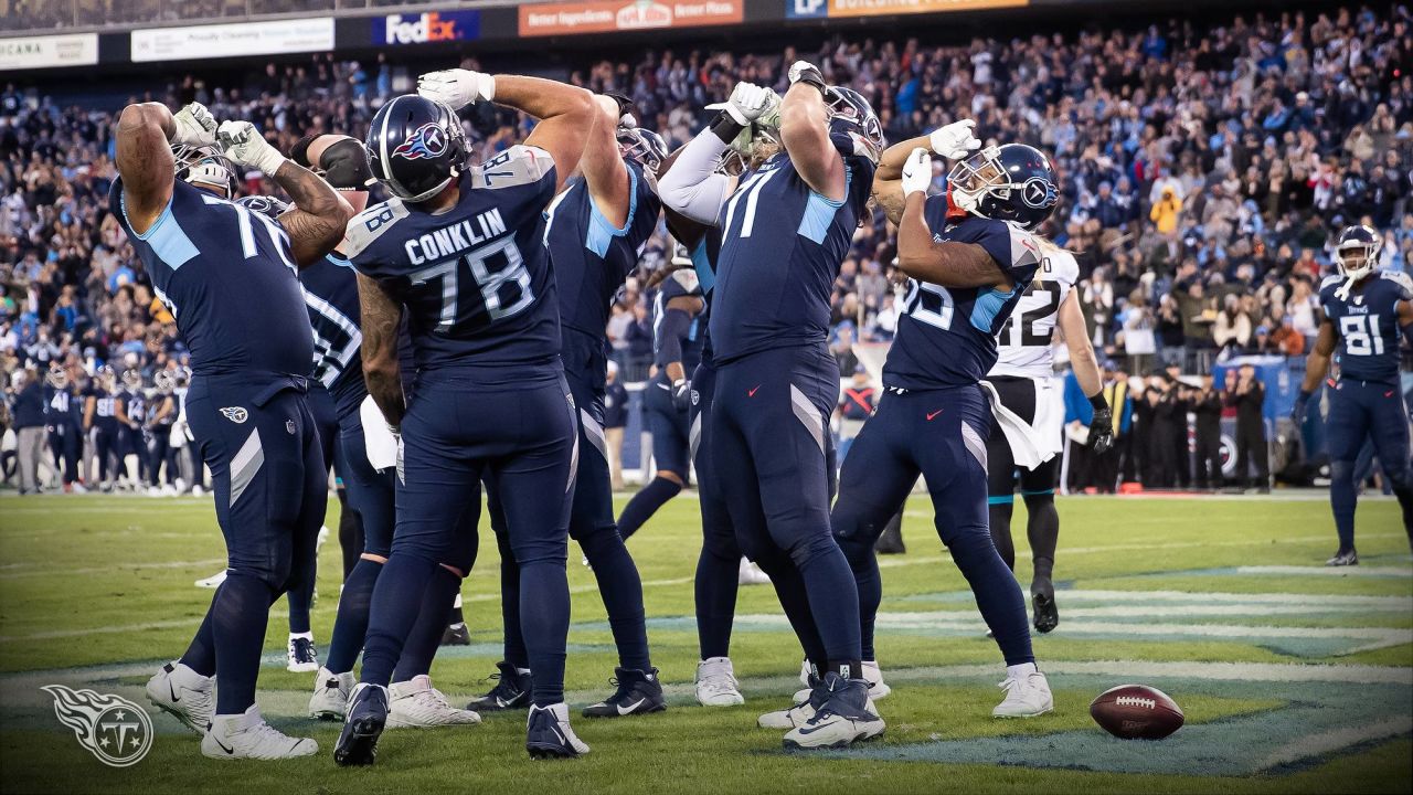 Tennessee Titans flags on the field after the team scored a touchdown in  the first half of their game against the Oakland Raiders at the Nissan  Stadium in Nashville, Tenn., Sunday, Sept.