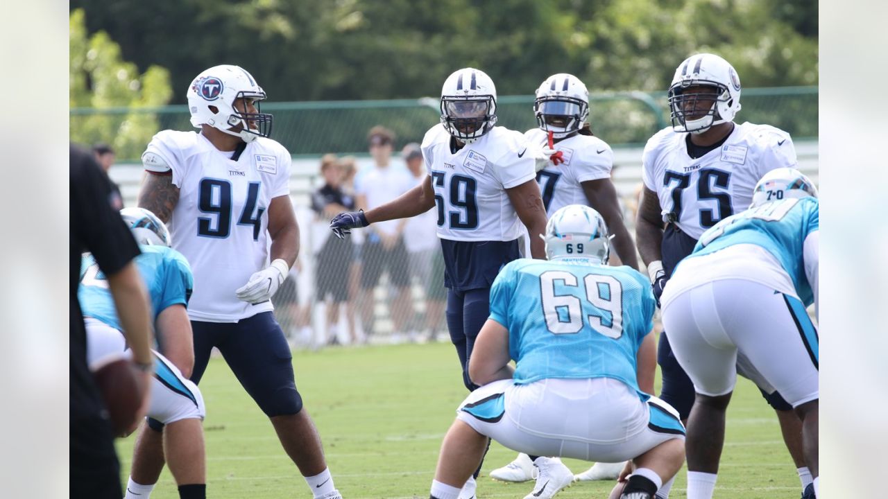 Tennessee Titans defensive tackle Trevon Coley (97) leaves the turf after  an injury against the Atlanta Falcons during the first half of a preseason  NFL football game, Friday, Aug. 13, 2021, in