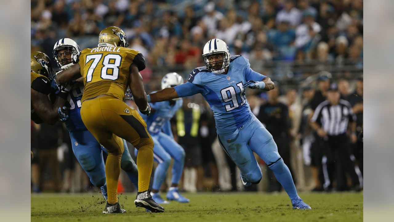 Tennessee Titans defensive end Denico Autry (96)runs onto the field as he's  introduced before their NFL football game against the Los Angeles Chargers  Sunday, Sept. 17, 2023, in Nashville, Tenn. (AP Photo/Wade