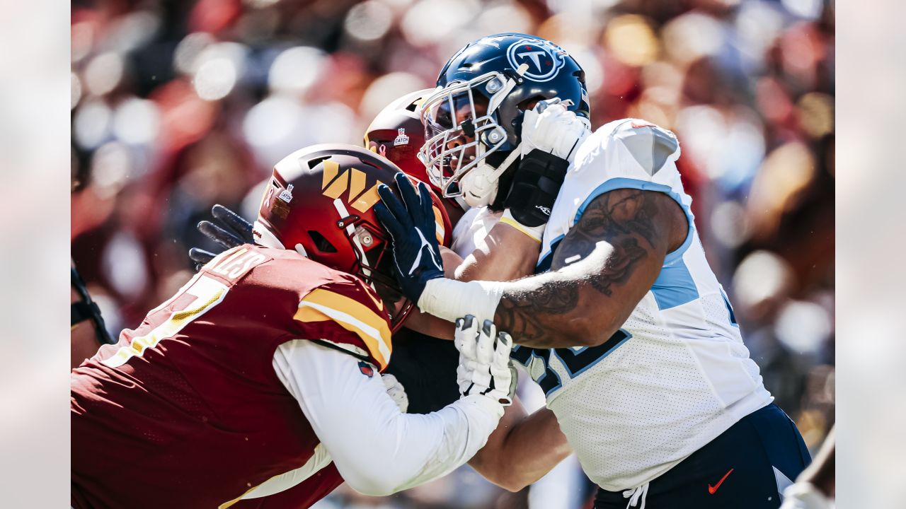 Tennessee Titans defensive tackle Denico Autry (96) walks back to the line  of scrimmage during the first half of an NFL football game against the New  England Patriots, Sunday, Nov. 28, 2021