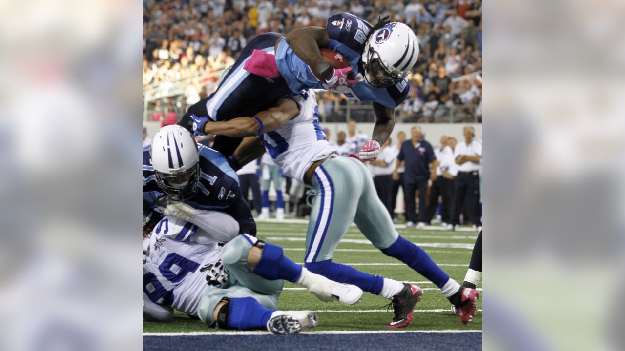 Tennessee Titans running back Chris Johnson (28), left, celebrates with  teammate Ahmard Hall (45) after scoring a touchdown in the fourth quarter  against the Kansas City Chiefs. The Titans defeated the Chiefs