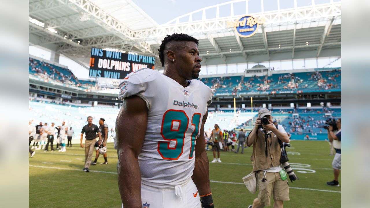 Miami Dolphins linebacker Raekwon McMillan (52) walks the sidelines, during  the second half of an NFL preseason football game against the Tampa Bay  Buccaneers, Thursday, Aug. 9, 2018, in Miami Gardens, Fla. (