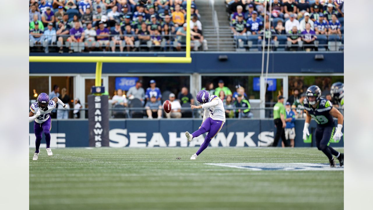 Minnesota Vikings running back Ty Chandler (32) runs with the ball during  an NFL pre-season football game against the Seattle Seahawks, Thursday,  Aug. 10, 2023 in Seattle. (AP Photo/Ben VanHouten Stock Photo 