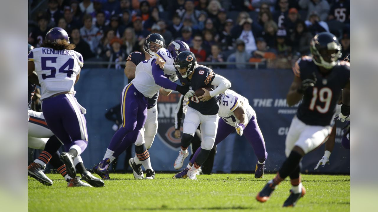 MINNEAPOLIS, MN - OCTOBER 30: Arizona Cardinals defensive tackle J.J. Watt  (99) sacks Minnesota Vikings Quarterback Kirk Cousins (8) during the second  half of a game between the Minnesota Vikings and Arizona