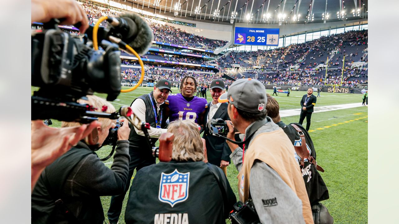 Minnesota Vikings fans hold up 'Defence' signs in support of their team  before the International Series NFL match at Twickenham, London Stock Photo  - Alamy