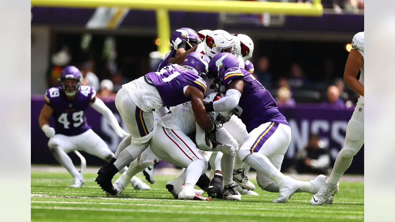 Arizona Cardinals wide receiver Davion Davis (10) runs down the field  during the first half of an NFL preseason football game against the  Minnesota Vikings, Saturday, Aug. 26, 2023, in Minneapolis. (AP