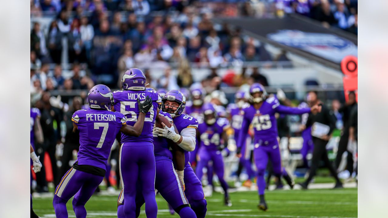 Minnesota Vikings punter Ryan Wright (14) celebrates after a play during an  NFL football game against the New Orleans Saints at Tottenham Hotspur  Stadium, Sunday, Oct. 2, 2022, in London. The Minnesota