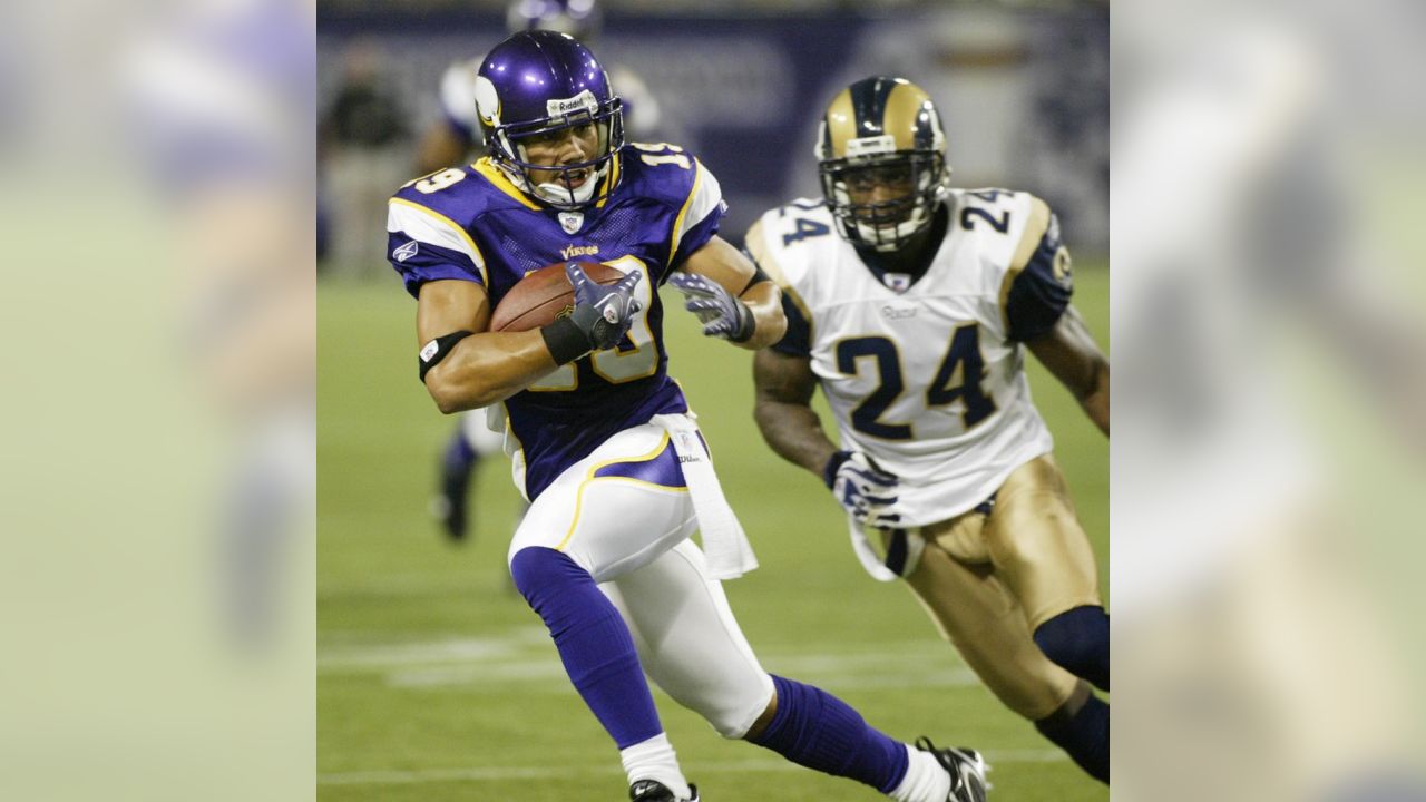 MINNEAPOLIS, MN - DECEMBER 26: Los Angeles Rams Quarterback Matthew  Stafford (9) under center during a game between the Minnesota Vikings and  Los Angeles Rams on December 26, 2021, at U.S. Bank