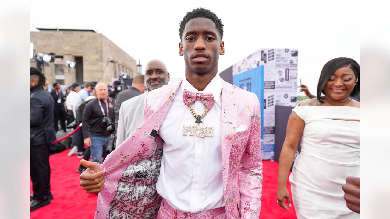 Jordan Addison Suits Up in Pink Florals & Sneakers at NFL Draft 2023 –  Footwear News