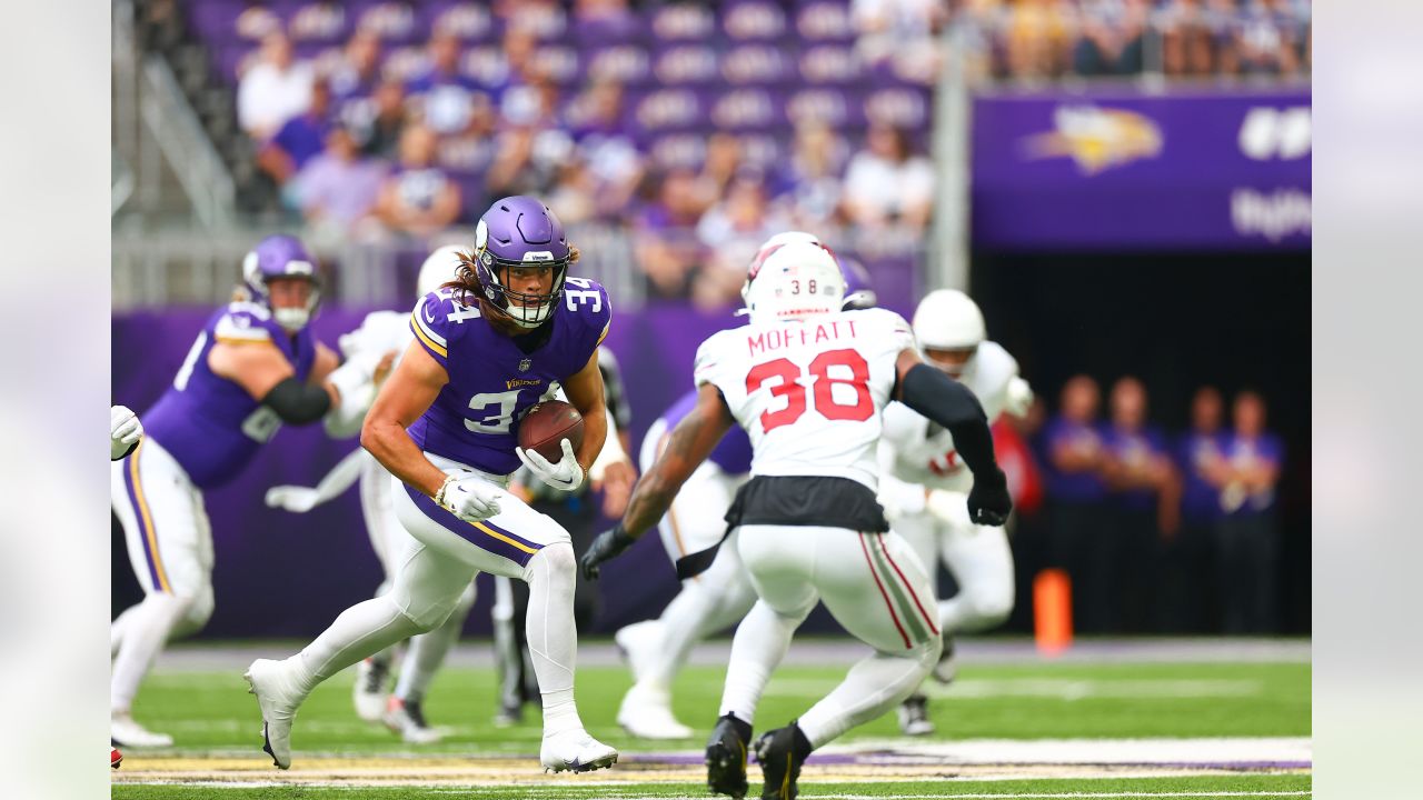 Arizona Cardinals wide receiver Davion Davis (10) runs down the field  during the first half of an NFL preseason football game against the  Minnesota Vikings, Saturday, Aug. 26, 2023, in Minneapolis. (AP